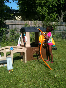 Child in playhouse