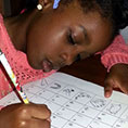Children with play laptops